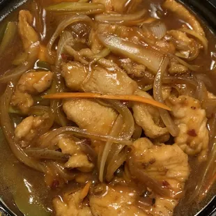 Chicken drenched in some kind of marinade