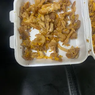 Twice microwaved "chicken" bits that we received in our 2 large chicken fried rice orders.