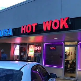 a car parked outside of a restaurant