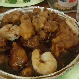 Orange chicken with 3 large shrimp added.  Huge portions and no shortage of flavor.