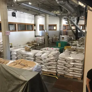 a man standing in a warehouse