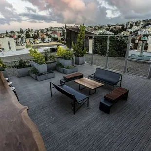 a patio with a view of the city