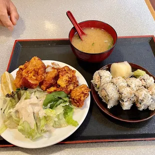 a plate of food and a bowl of soup