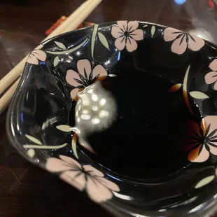 Adorable little sushi soy sauce dipping accessories.