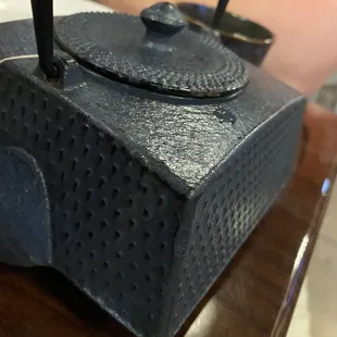 tasteful table-side cast iron teapots.