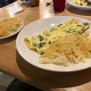 Spinach and feta omelette with hash browns