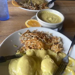 Eggs Benedict, I asked for a side of Hollaindaise and they gave me a WHOLE CUP and drowned my food