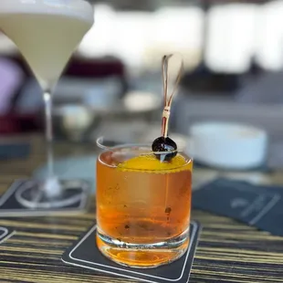 two cocktails on a table