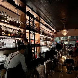 people sitting at the bar