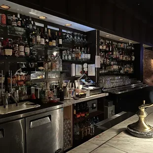 a woman sitting at the bar