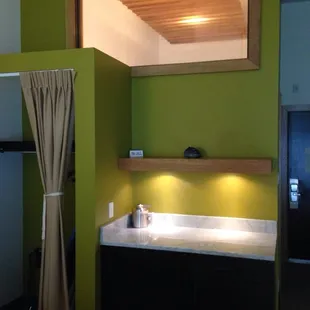 Open concept with high ceilings &amp; "view" into the bathroom