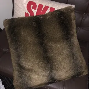 Decorative pillows placed on top of bed and pillows. These rarely get washed with this type of material. Unhygienic for COVID-19.