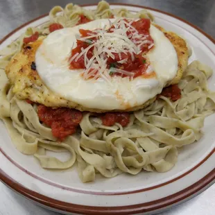 Chicken Parmesan with housemade fettuccine noodles