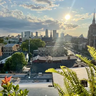 the sun setting over a city