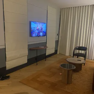 Living room area leading to the large balcony. Spacious