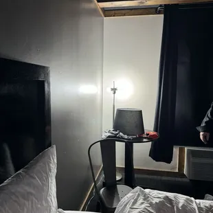 We took the lampshade off trying to get more light in room