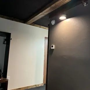 Cheaply painted walls and so dark in room