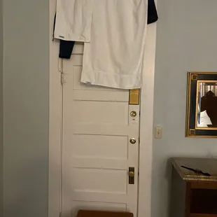 Window above the door would keep you up all night because doesn't block hall light very well.