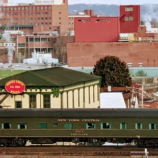 a train on the tracks in a city