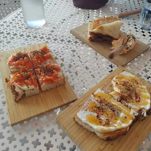 Pan con Tomate (left), Hot Honey Tosta (bottom right), and Pimento Cheese board (upper right)