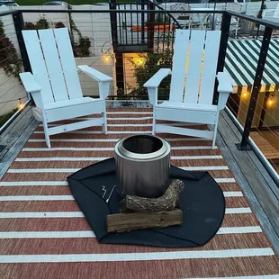 Fire pit on-top of room. Just wish the wood was cut in half so the pit is truly smokeless like meant to be.