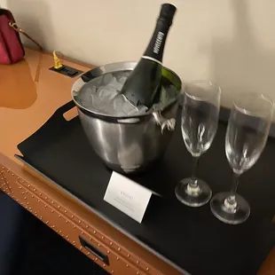 Room service delivery of sparkling wine