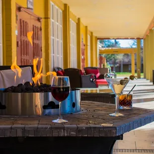 A confortable view of part of our patio with full service from our restaurant and bar!