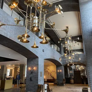 Trumpet chandeliers in the lobby