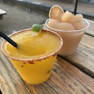 Happy hour frozen margs (mango habanero and guava mezcal)