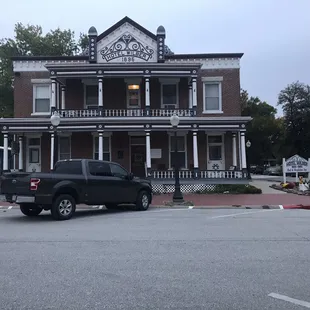 a truck parked in front of a building