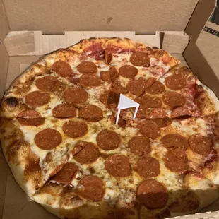 Vegan Pepperoni with real cheese. Half BBQ sauce and half Marinara... yum!