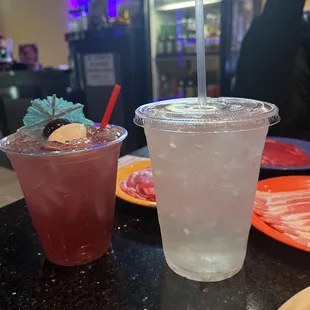 Blackberry lychee martini (left) coconut water (right)