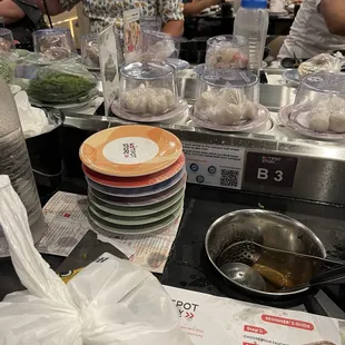 Sitting at the bar seating table after first visit on a packed Saturday night.