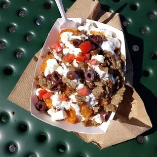 MOST UNIQUE use of tots that our mouths had the pleasure of enjoying so far...crispy hot tots gyro loaded..YUMMY tots ziki