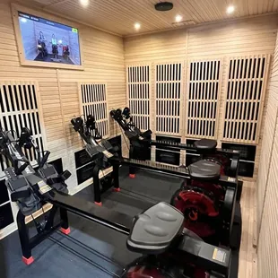 Sauna with dual cable rowers.