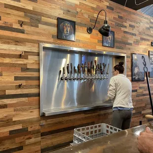 a man and a woman at a bar