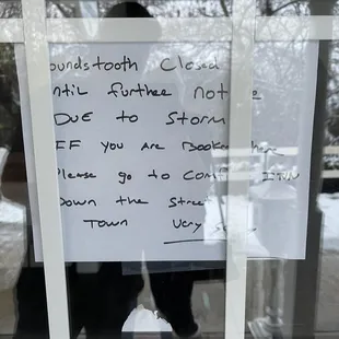 Hand written note on the Houndstooth door.