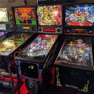 a row of pinball machines