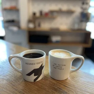 High-top seating area in front of the brand products display shelf