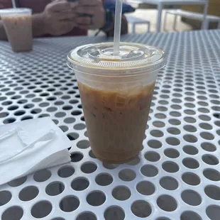 Iced latte while waiting to charge my Tesla!