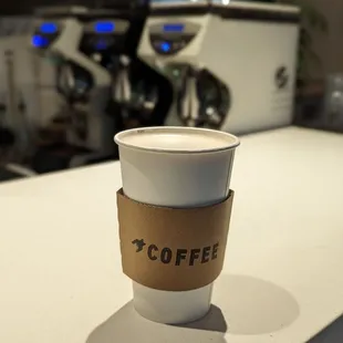 a cup of coffee on a counter