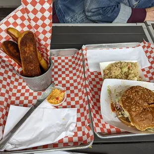 Pulled pork sandwich and pretzel sticks