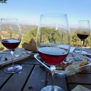 two glasses of wine on a table