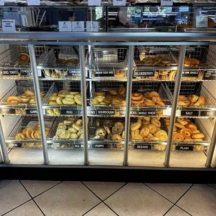 a display case of bagels
