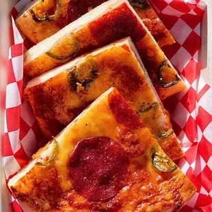 Pepperoni &amp; Jalapeño Bagel Pizza, warmed &amp; cut into bite size pieces.