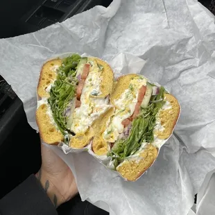 Veggie Sandwich with egg w/chives and avocado on egg bagel