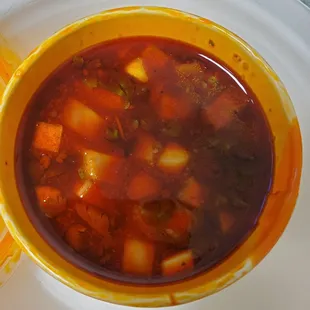 Consome on the side to dip that birria in!