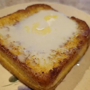 HK French Toast. Butter and condensed milk on top mmMMMm?mmmm