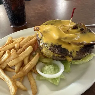 Two 1/2 lbs burger patties with bacon and cheese