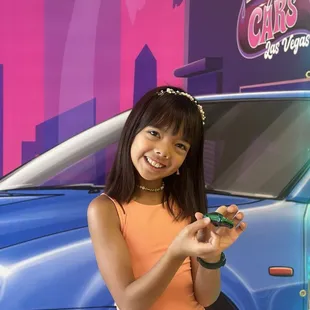 Happy kid with a customized Tesla